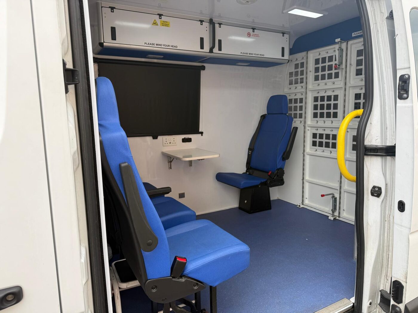 Inside a PSS secure ambulance — seating and secure compartment